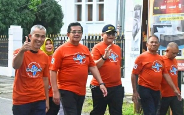 Pj Wali Kota Padang Ikuti Jalan Santai Ikatan Alumni SMPN 4 Padang